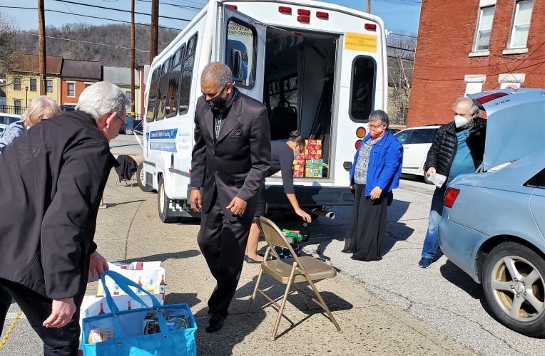 Rev. Darrell Cummings Gets Assistance to ‘Stuff the Bus’